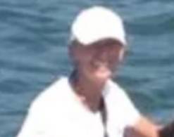 Julie Zitz on boat with dogs
