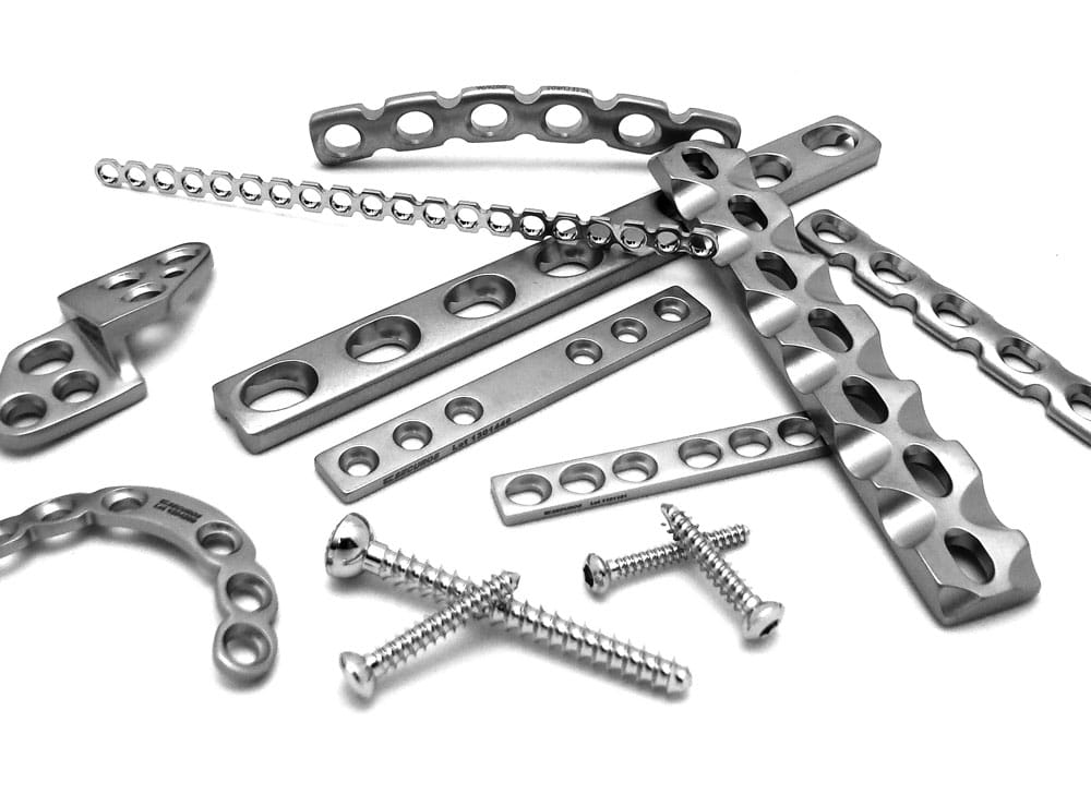 Pile of Securos plates and screws